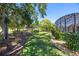 Sprawling backyard with mature trees and lush landscaping provides a private and serene outdoor space at 128 Hallstrom Ct, Debary, FL 32713