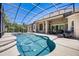 Stunning screened-in pool area perfect for entertaining and outdoor enjoyment at 128 Hallstrom Ct, Debary, FL 32713