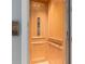 Interior of an elevator featuring wood walls, safety features, and accessibility at 129 S Park Ave # 129, Winter Garden, FL 34787
