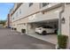 Garage with a car inside, well-lit with a clean and organized interior at 129 S Park Ave # 129, Winter Garden, FL 34787