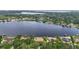 Spacious community with waterfront homes, private docks, and lush greenery, offering a luxurious lifestyle at 13025 Water Point Blvd, Windermere, FL 34786
