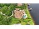 Expansive estate with a private dock, a sparkling pool, manicured grounds, and an attached garage at 13025 Water Point Blvd, Windermere, FL 34786