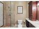 Modern bathroom featuring glass shower with rainfall shower head, and custom built-in vanity at 13025 Water Point Blvd, Windermere, FL 34786