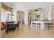 Open concept with kitchen, breakfast nook, and bar seating at 13025 Water Point Blvd, Windermere, FL 34786