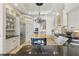 Bright kitchen with custom cabinets, stainless appliances, and large center island at 13025 Water Point Blvd, Windermere, FL 34786