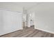 Spacious bedroom featuring a closet and light wood flooring at 13971 Sw 46Th Ter, Ocala, FL 34473