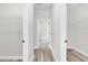 Hallway with walk-in closets on both sides of the hall at 13971 Sw 46Th Ter, Ocala, FL 34473