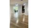 Open living area with tile floors and natural light flowing into kitchen at 1414 Meadowlark St, Longwood, FL 32750
