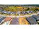 Stunning aerial view of the neighborhood showcasing the golf course and green space at 16018 Volterra Pt, Bella Collina, FL 34756