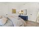Inviting bedroom with a dresser, ample closet space, and lots of natural light from nearby windows at 16018 Volterra Pt, Bella Collina, FL 34756