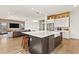 Spacious kitchen with a large island, stainless steel appliances, and an open layout at 16018 Volterra Pt, Bella Collina, FL 34756