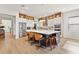 Open concept kitchen features a large island, stainless steel appliances and ample cabinetry at 16018 Volterra Pt, Bella Collina, FL 34756