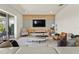 Cozy living room features stylish decor, natural lighting, and a serene atmosphere at 16018 Volterra Pt, Bella Collina, FL 34756