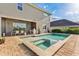 Relaxing pool and spa combination with outdoor dining area, grill, and lush greenery at 16018 Volterra Pt, Bella Collina, FL 34756