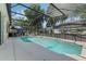 Inviting screened-in pool with clear blue water, spacious patio area, and comfortable seating at 16810 Sunrise Vista Dr, Clermont, FL 34714