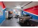 Fun game room equipped with a pool table, foosball, basketball, and Star Wars themed wall art at 2036 Lelani Cir, Davenport, FL 33897
