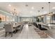 A spacious, open-concept living area with dining and kitchen, perfect for entertaining and Gathering gatherings at 2036 Lelani Cir, Davenport, FL 33897