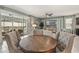 Comfortable living room with access to the screened in patio, stylish decor, and tile flooring at 2036 Lelani Cir, Davenport, FL 33897