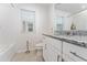 Clean bathroom featuring a shower/tub combination and granite countertops at 2214 Centerra Loop, Kissimmee, FL 34741