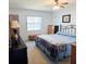 Serene bedroom features a queen bed, neutral decor, and plenty of storage space at 240 Windmeadows St # 240, Altamonte Springs, FL 32701