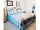 Comfortable bedroom with a queen bed, carpeted floors, and ample natural light at 240 Windmeadows St # 240, Altamonte Springs, FL 32701