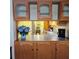 Updated kitchen offers wooden cabinets and a breakfast bar, perfect for casual dining at 240 Windmeadows St # 240, Altamonte Springs, FL 32701