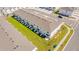 Aerial view of modern townhomes with new construction and lots of green space at 2413 Brook Marsh Loop, Kissimmee, FL 34747