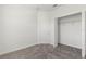 Bedroom with plush carpet and walk-in closet at 2413 Brook Marsh Loop, Kissimmee, FL 34747