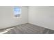 Comfortable bedroom with carpet flooring and a window offering natural light at 2413 Brook Marsh Loop, Kissimmee, FL 34747