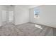 Bright bedroom with neutral carpeting and a window offering natural light at 2413 Brook Marsh Loop, Kissimmee, FL 34747