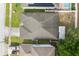 Aerial shot of the roof with backyard and neighborhood views, showing the property's layout and location at 252 Elgin Blvd, Davenport, FL 33897