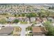 An aerial view shows the property located in a neighborhood setting, near a major highway and commercial development at 252 Elgin Blvd, Davenport, FL 33897