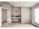 Bedroom featuring light wood-look floors and a built-in desk at 252 Elgin Blvd, Davenport, FL 33897