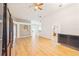 Spacious living room with tile floors, arched doorways, and neutral walls, offering a versatile living space at 252 Elgin Blvd, Davenport, FL 33897