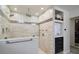 Elegant bathroom with walk-in shower, tiled walls, and convenient shelving at 2532 Waterview Pl, Windermere, FL 34786