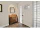 Inviting foyer with glass-block sidelights and wood-look tile floors at 2532 Waterview Pl, Windermere, FL 34786