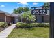 Charming brick home with well-maintained landscaping, a manicured lawn, and a welcoming facade, showcasing curb appeal at 2532 Waterview Pl, Windermere, FL 34786