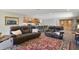 Open-concept living room showcasing the kitchen, and classic furniture at 2532 Waterview Pl, Windermere, FL 34786
