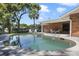 An expansive backyard with a private swimming pool, landscaped yard and covered patio at 2532 Waterview Pl, Windermere, FL 34786