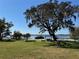 Scenic waterfront park with mature trees draped in Spanish moss offering serene views and recreational amenities at 2532 Waterview Pl, Windermere, FL 34786