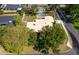 Aerial view of home with lush landscaping and a backyard pool at 2609 Chinook Trl, Maitland, FL 32751
