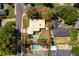 Stunning aerial view of a home with a backyard pool and lush landscaping at 2609 Chinook Trl, Maitland, FL 32751