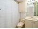 Bathroom featuring a shower with white curtain, vanity and toilet at 2609 Chinook Trl, Maitland, FL 32751