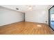 Spacious bedroom with wood floors and lots of natural light from sliding glass doors at 2609 Chinook Trl, Maitland, FL 32751