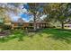 Inviting single-story brick home with a well-manicured lawn and established landscaping at 2609 Chinook Trl, Maitland, FL 32751
