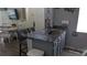 Stylish kitchen island with granite countertop, seating, and contemporary finishes at 2618 Lodi Cir # 102, Kissimmee, FL 34746
