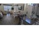 Open-concept living area with island seating, modern furnishings, and abundant natural light at 2618 Lodi Cir # 102, Kissimmee, FL 34746