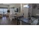 Inviting living area featuring an island, dining space, and comfortable seating at 2618 Lodi Cir # 102, Kissimmee, FL 34746