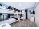 bedroom featuring bunk beds, playful decor, and a fun atmosphere at 2771 Oxymoron Way, Kissimmee, FL 34746