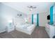 Beautiful bedroom featuring a plush bed, modern decor, and ample natural light at 2771 Oxymoron Way, Kissimmee, FL 34746